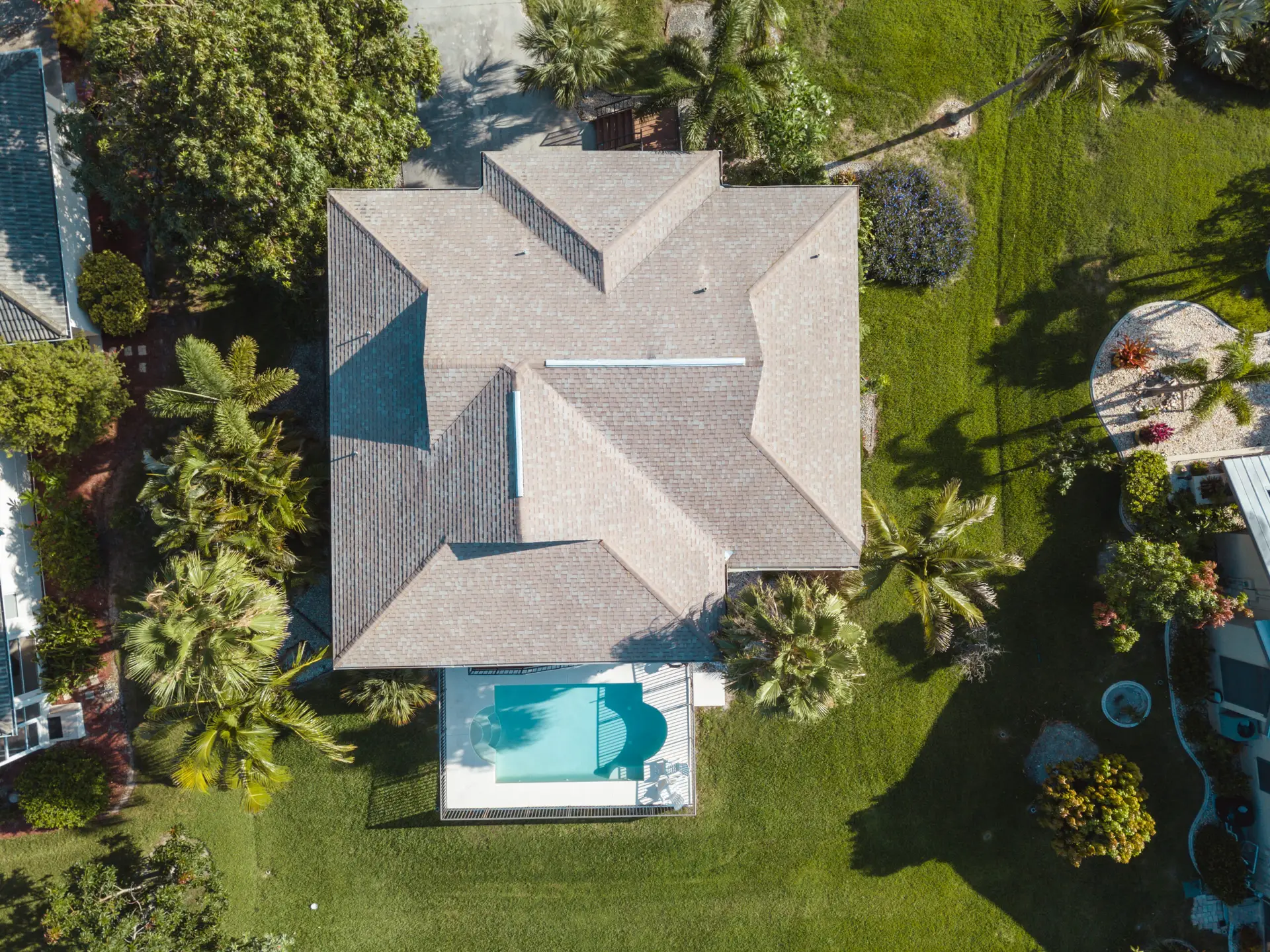 The image is an aerial view of a single-family home.